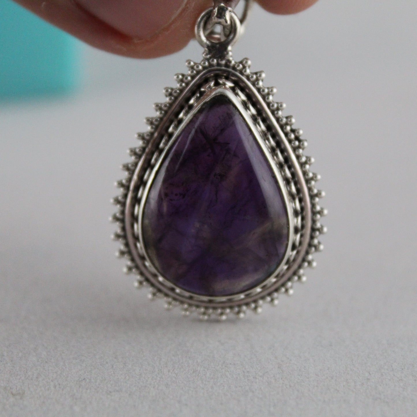 Midnight Bloom – Amethyst Teardrop Pendant