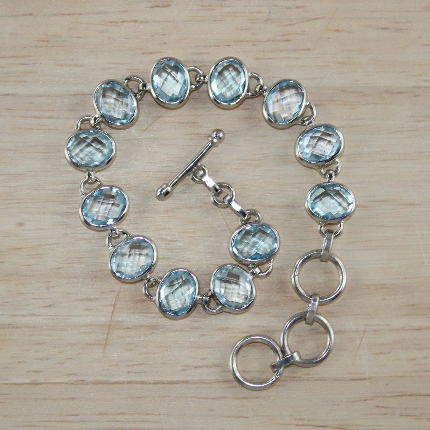 Oval Blue Topaz Gemstones Sterling Silver Bracelet