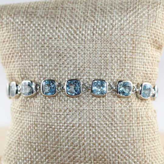 Elegant Sterling Silver Bracelet with Square Blue Topaz Gemstone