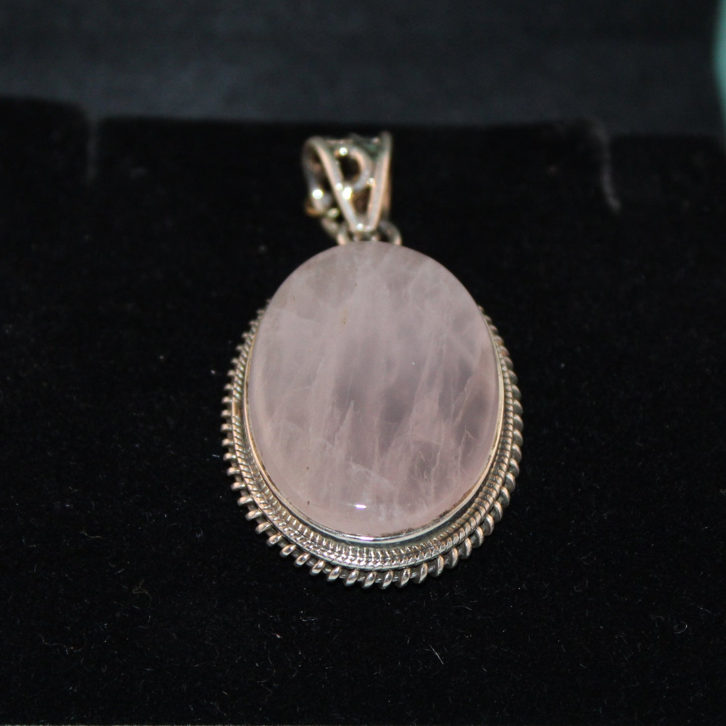 Rose quartz pendant in a silver setting