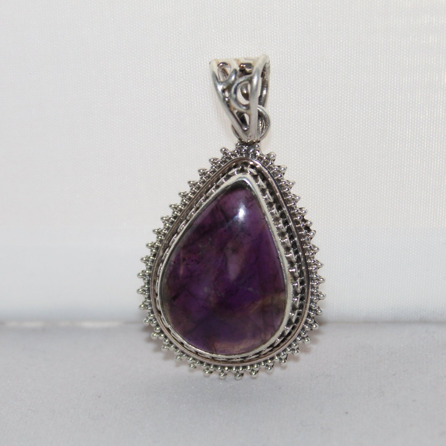 Midnight Bloom – Amethyst Teardrop Pendant